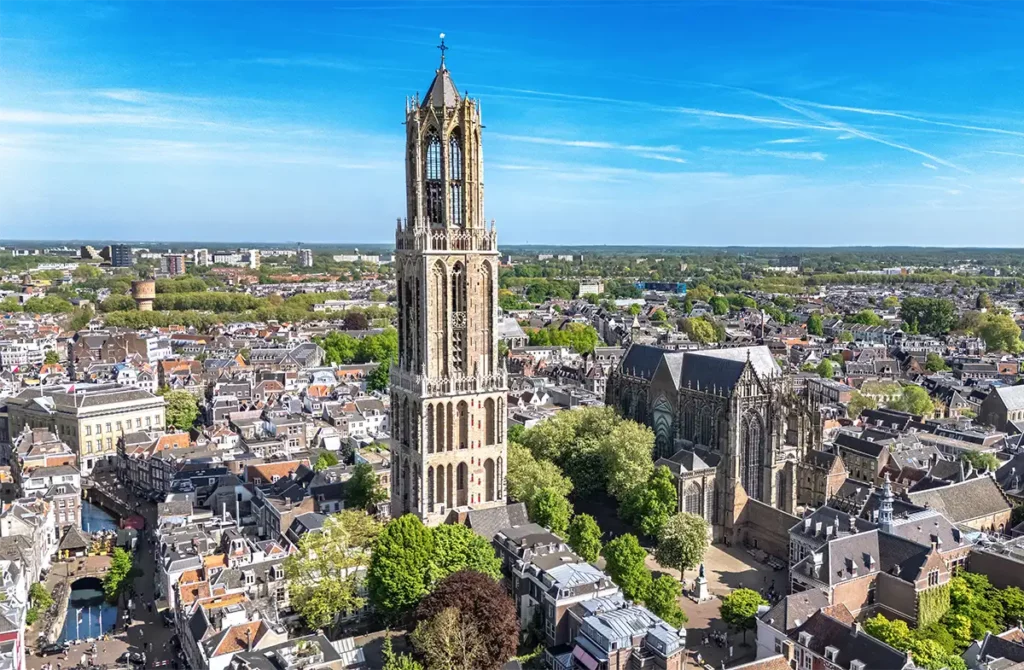 The historic city from Utrecht from above, with the Dom Tower rising way above eeverything.