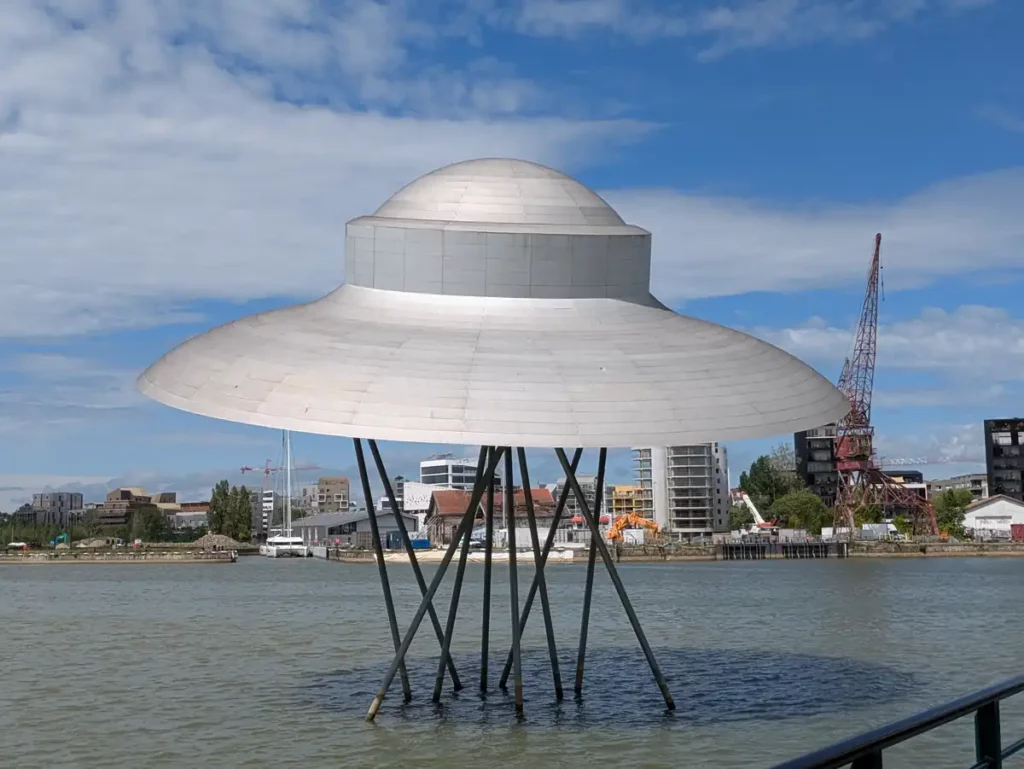 A UFO sculpture in the harbour near the Cité du Vin