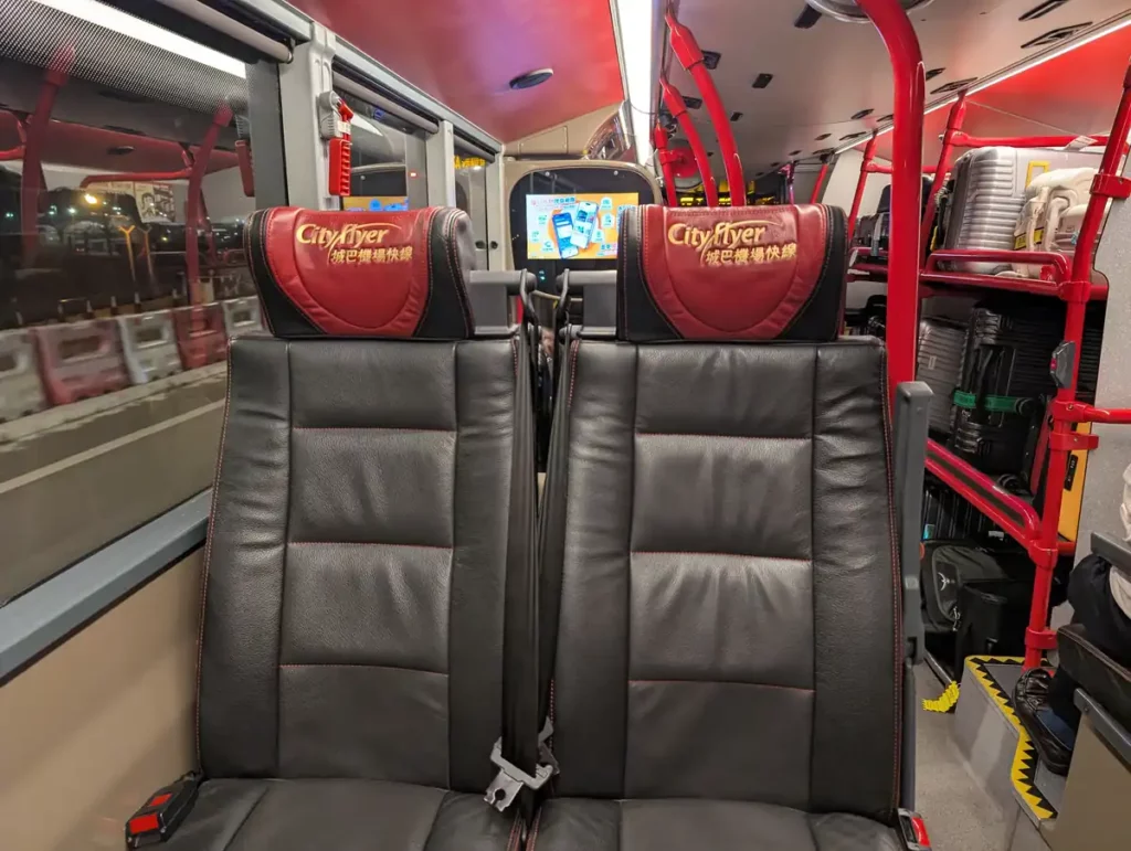 On board a Cityflyer airport bus in Hong Kong. The luggage rack is to the right.