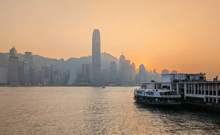A Hong Kong Star Ferry crossing Victoria Harbour at sunset
