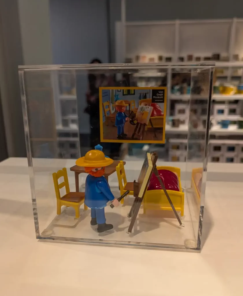 A Playmobil set of Van Gogh painting his bedroom in the museum shop