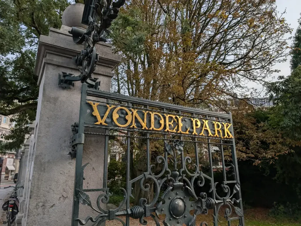 An ornate metal gate, with the word Vondelpark in gold