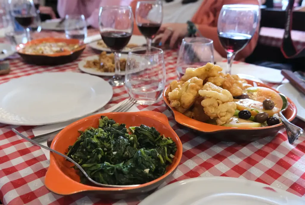 A table full of traditional Portuguese food and wine