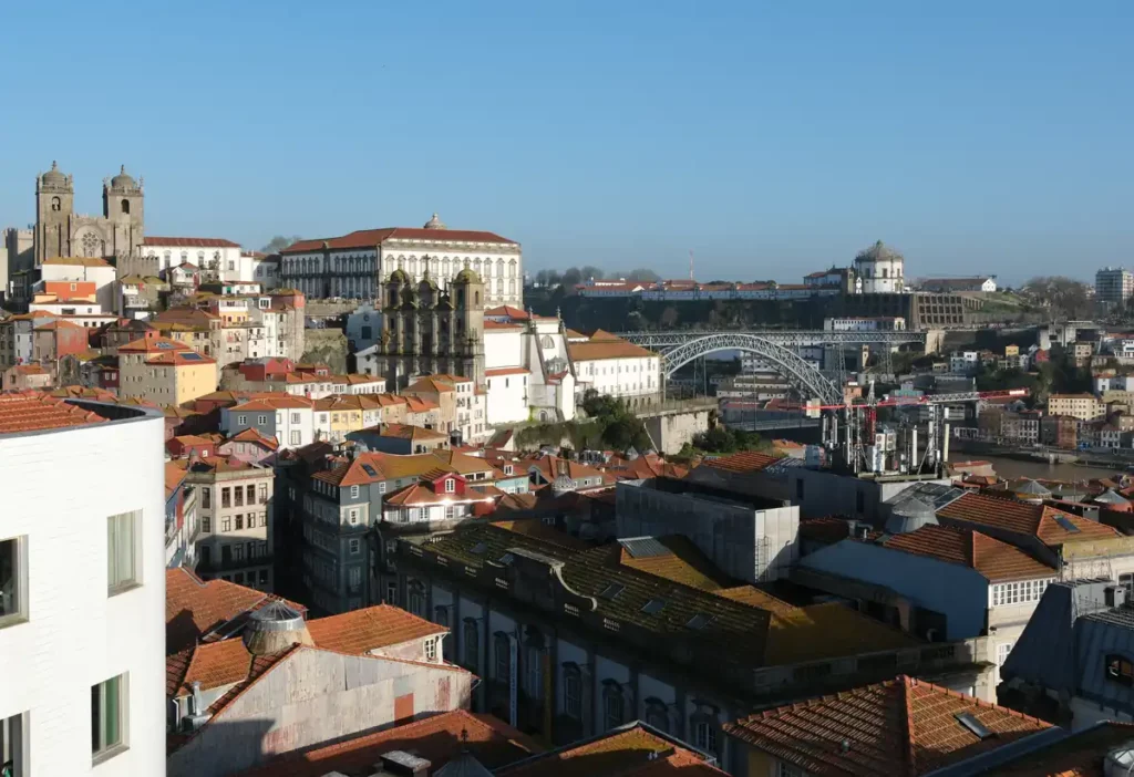 A beautiful view across the old town of Porto towards the famous bridge in the late afternoon