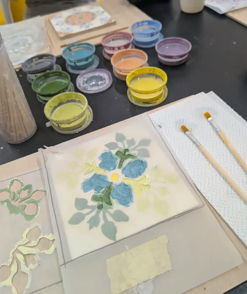 Painting an azulejo at a tile-painting class in Porto. The range of activities is one of the best reasons to visit Porto.