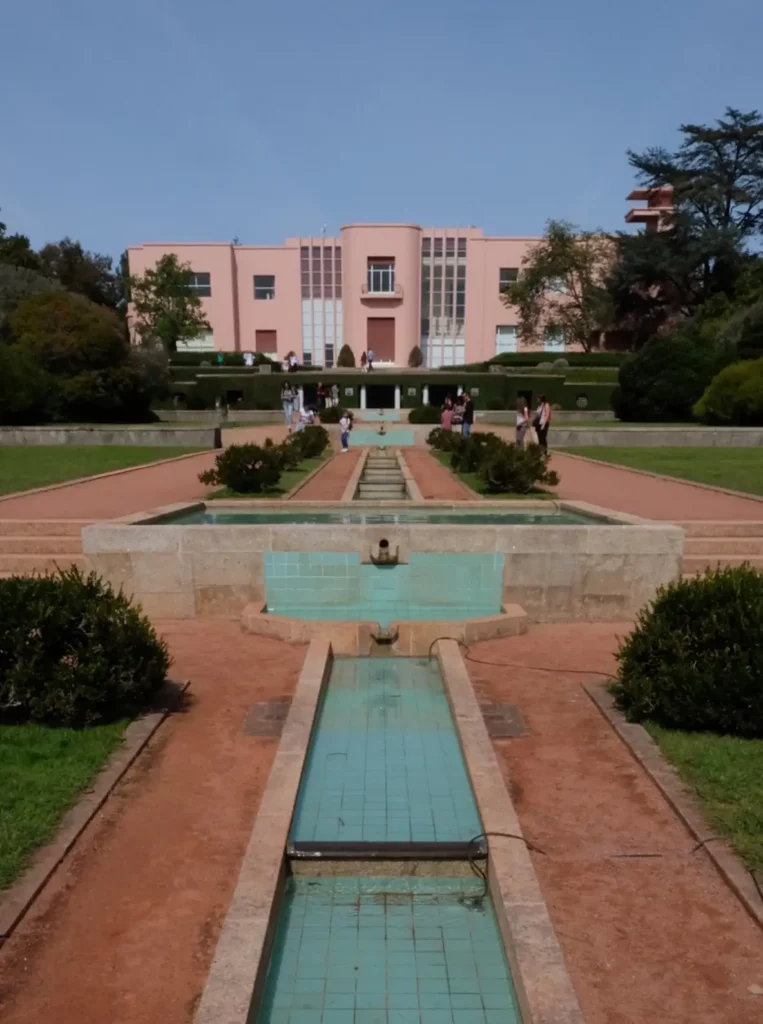 A gorgeous pink art deco mansion in gardens
