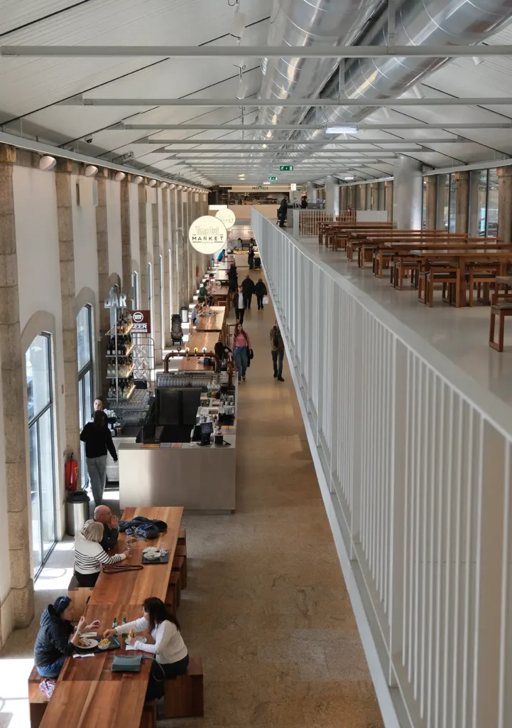 A large, airy hall with tables to eat at