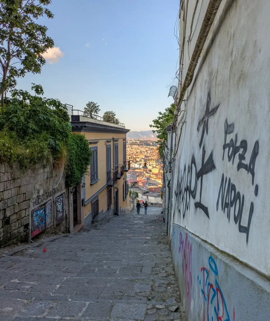 Forza Napoli football graffiti on a wall in Vomero