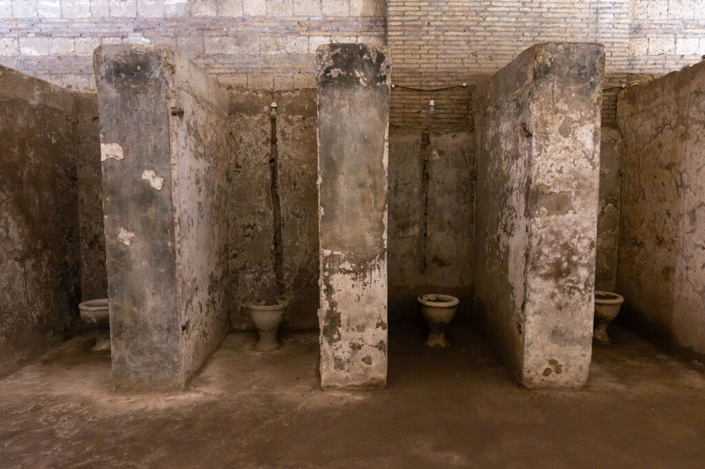 A row of toilet cubicles