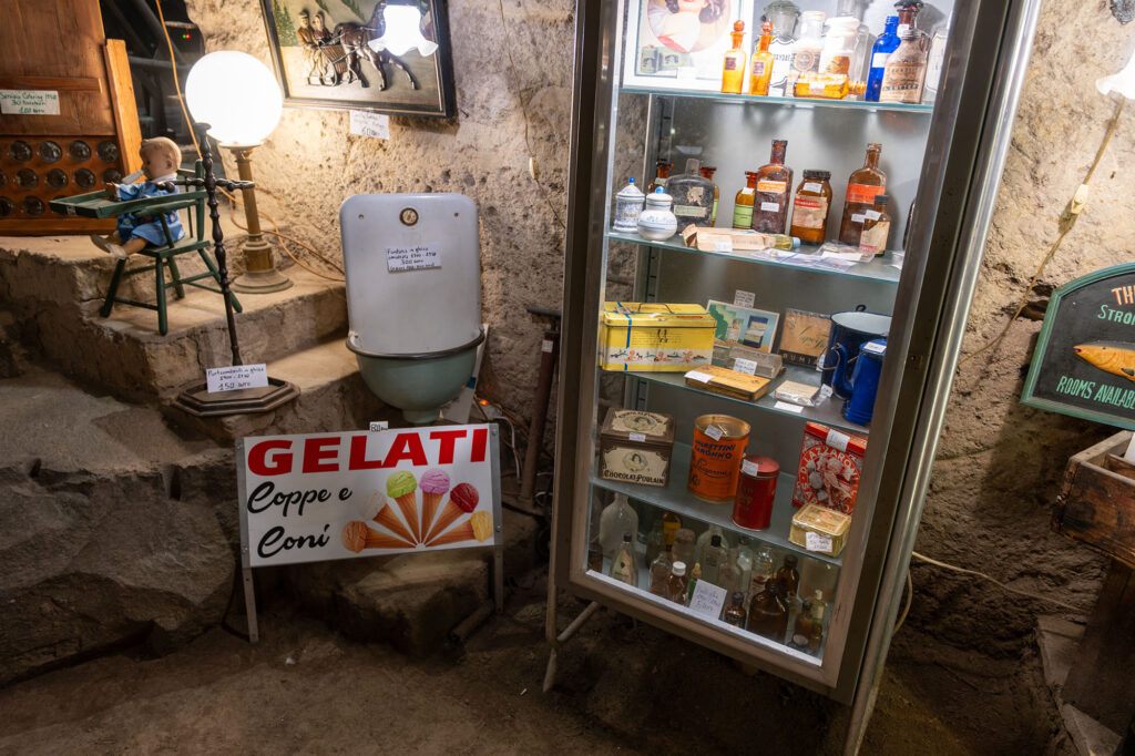 Vintage signs, bottles and other household items for sale